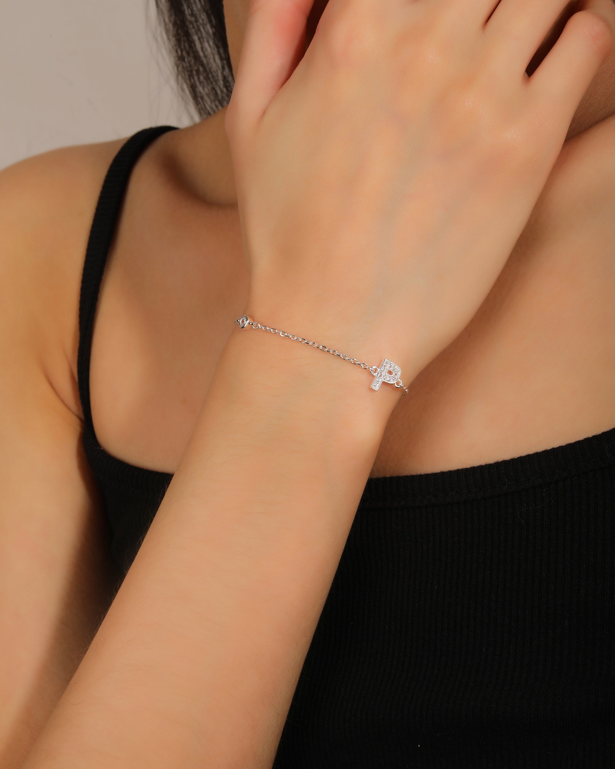 Pulsera de letra con circonia 17+3cm blanca en plateado
