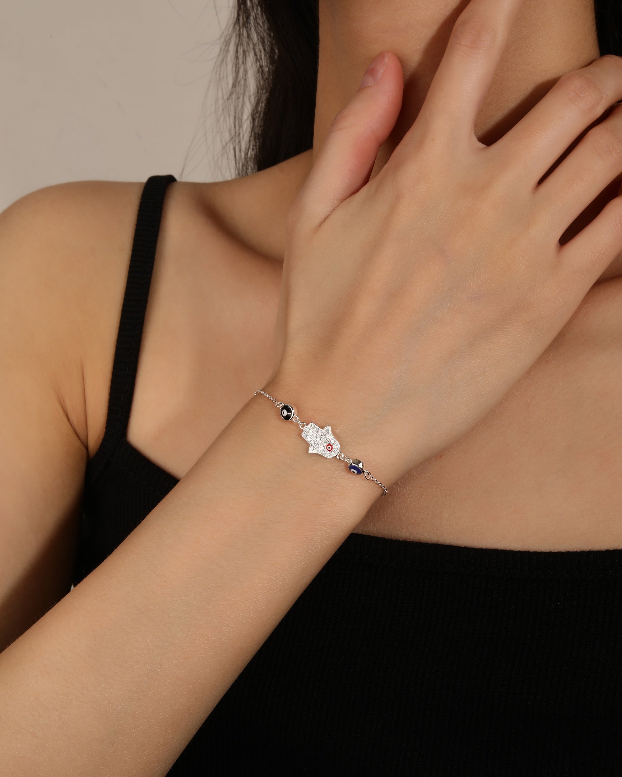 Pulsera de ojos turcos y mano de fatima con micro-pavi© de circonias en plateado