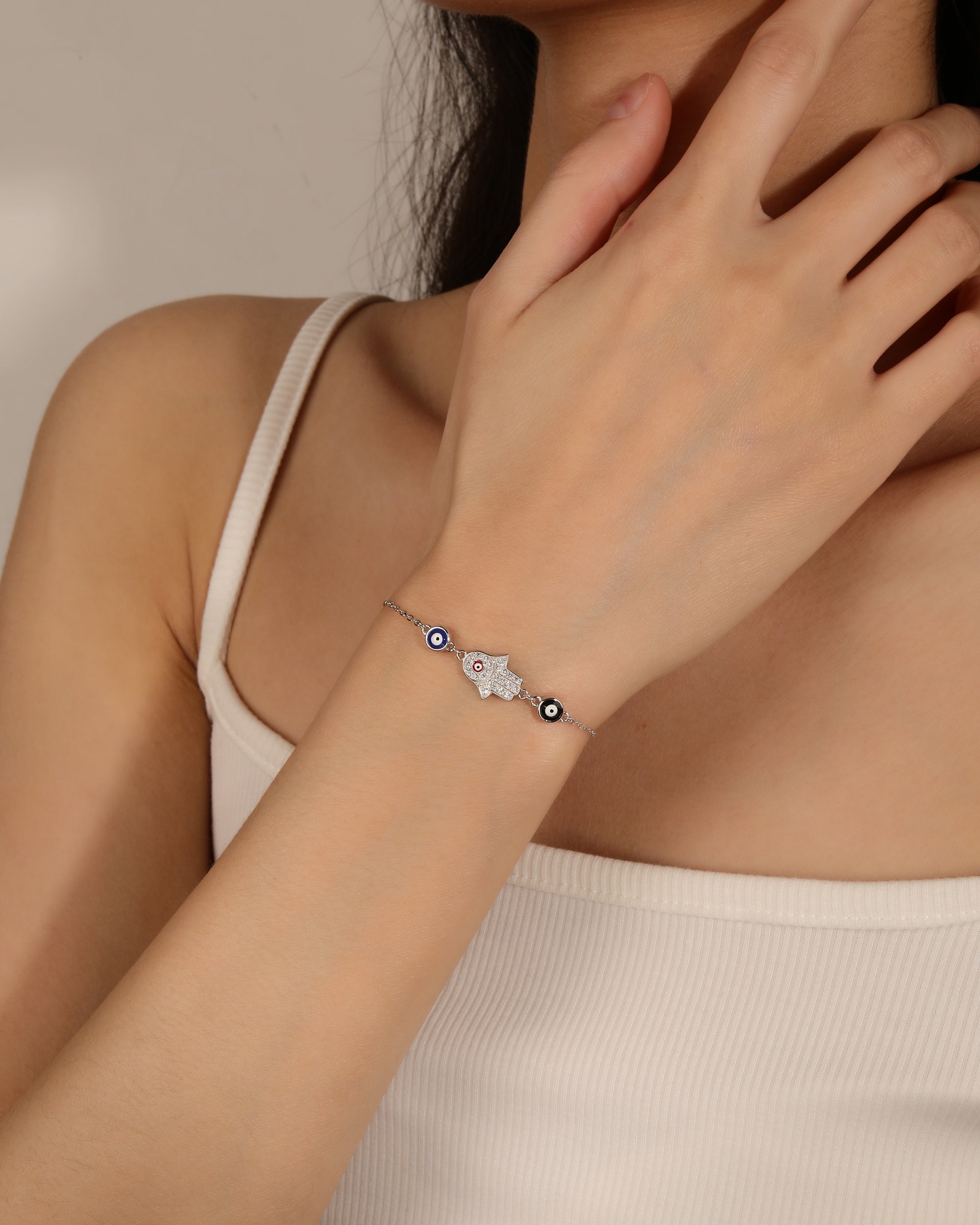 Pulsera de ojos turcos y mano de fatima con micro-pavi© de circonias en rodizado