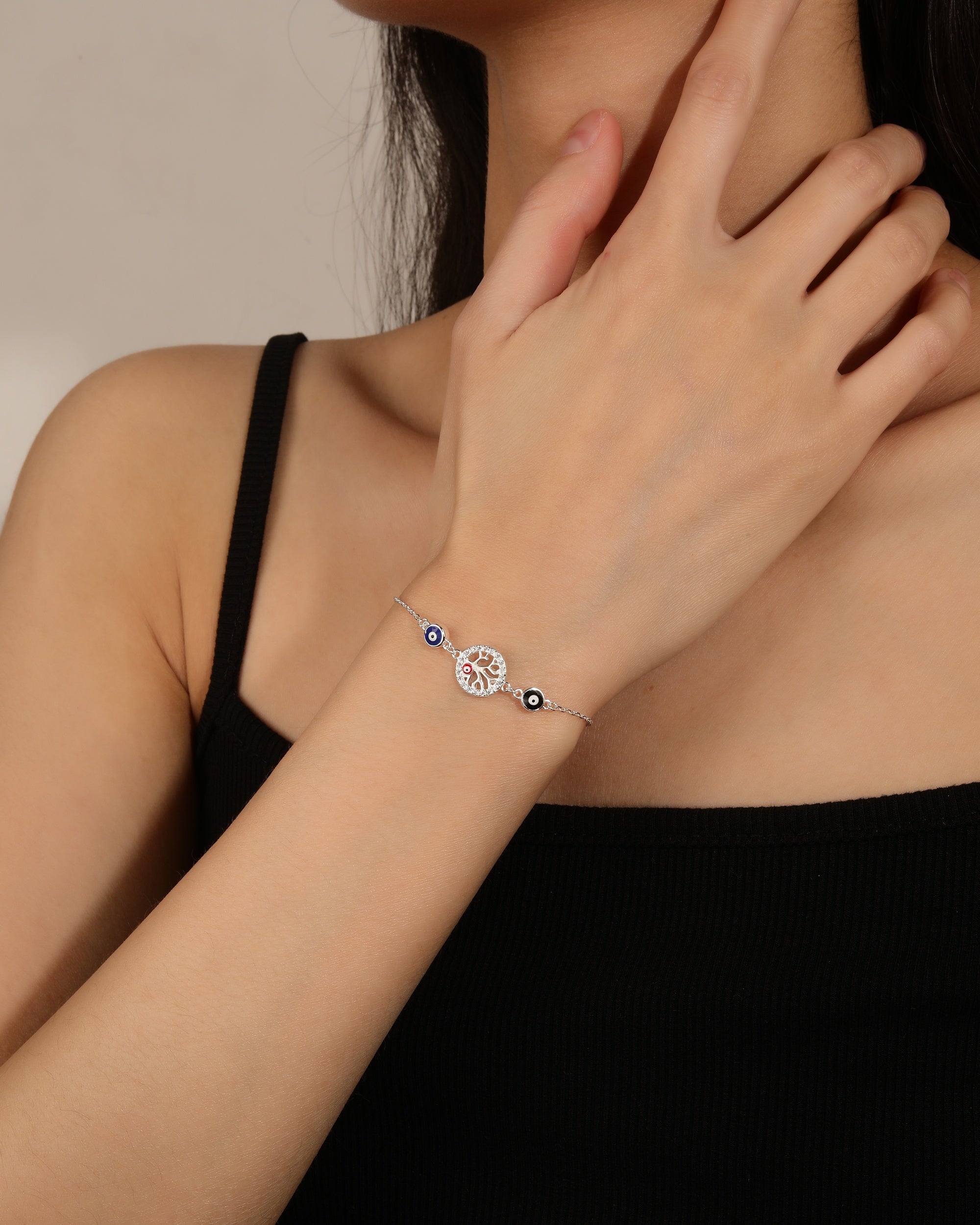 Pulsera sencilla de ojos turcos con arbol de la vida y circonias en plateado