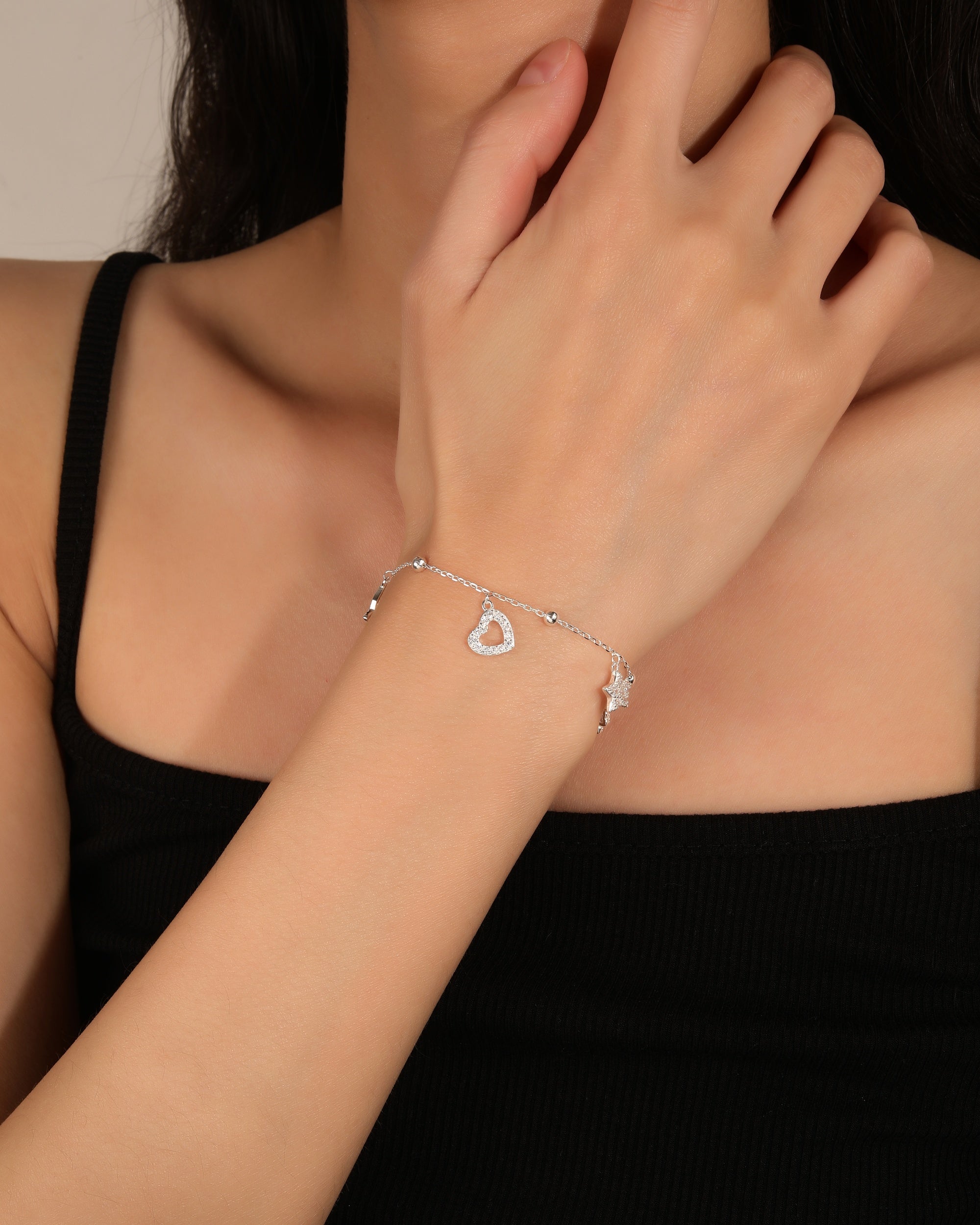 Pulsera sencilla de dijes con circonia blanca 17+3cm en plateado