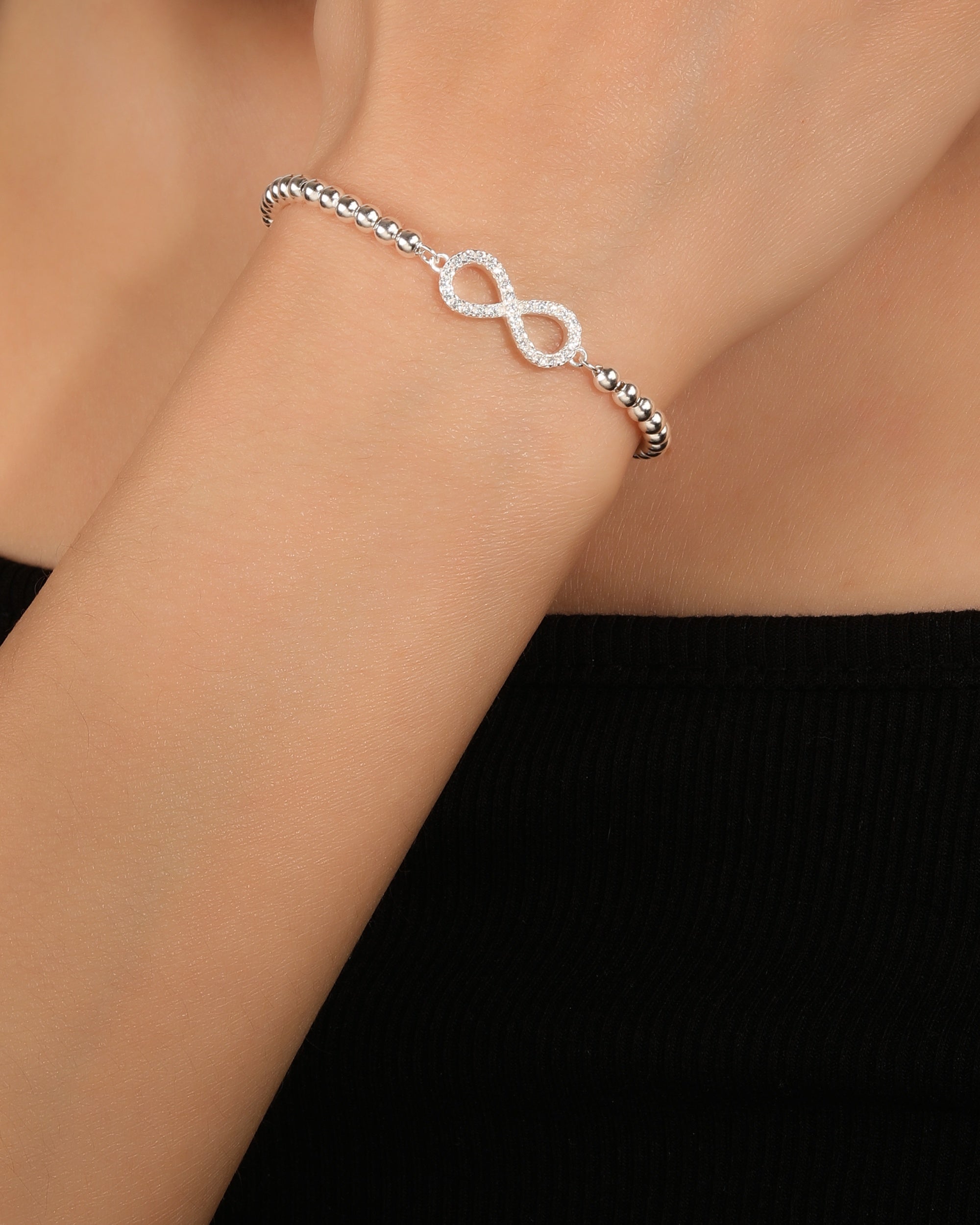 Pulsera sencilla de infinito con circonia blanca 17+3cm en plateado