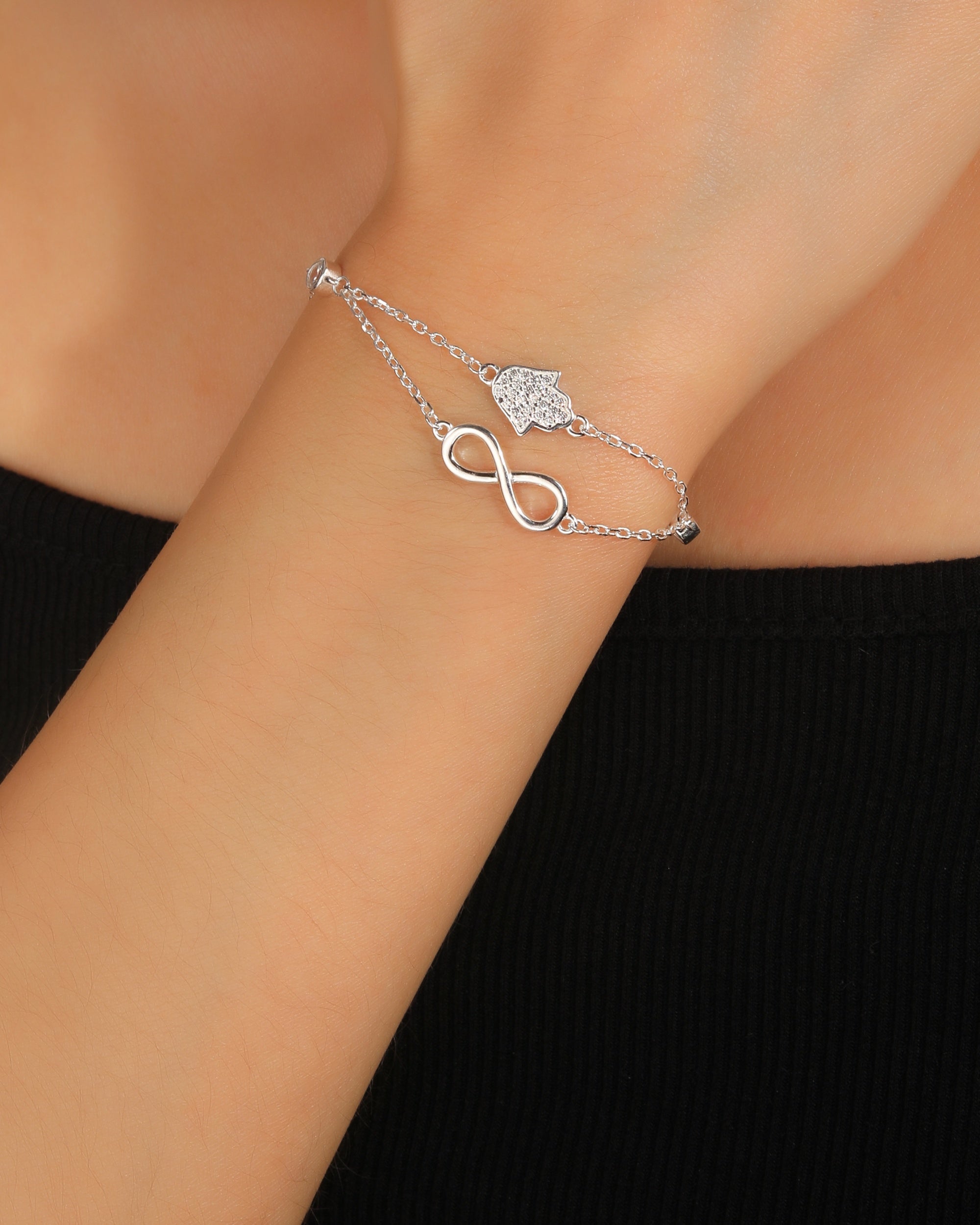 Pulsera doble de infinito con circonia blanca 17+3cm en plateado