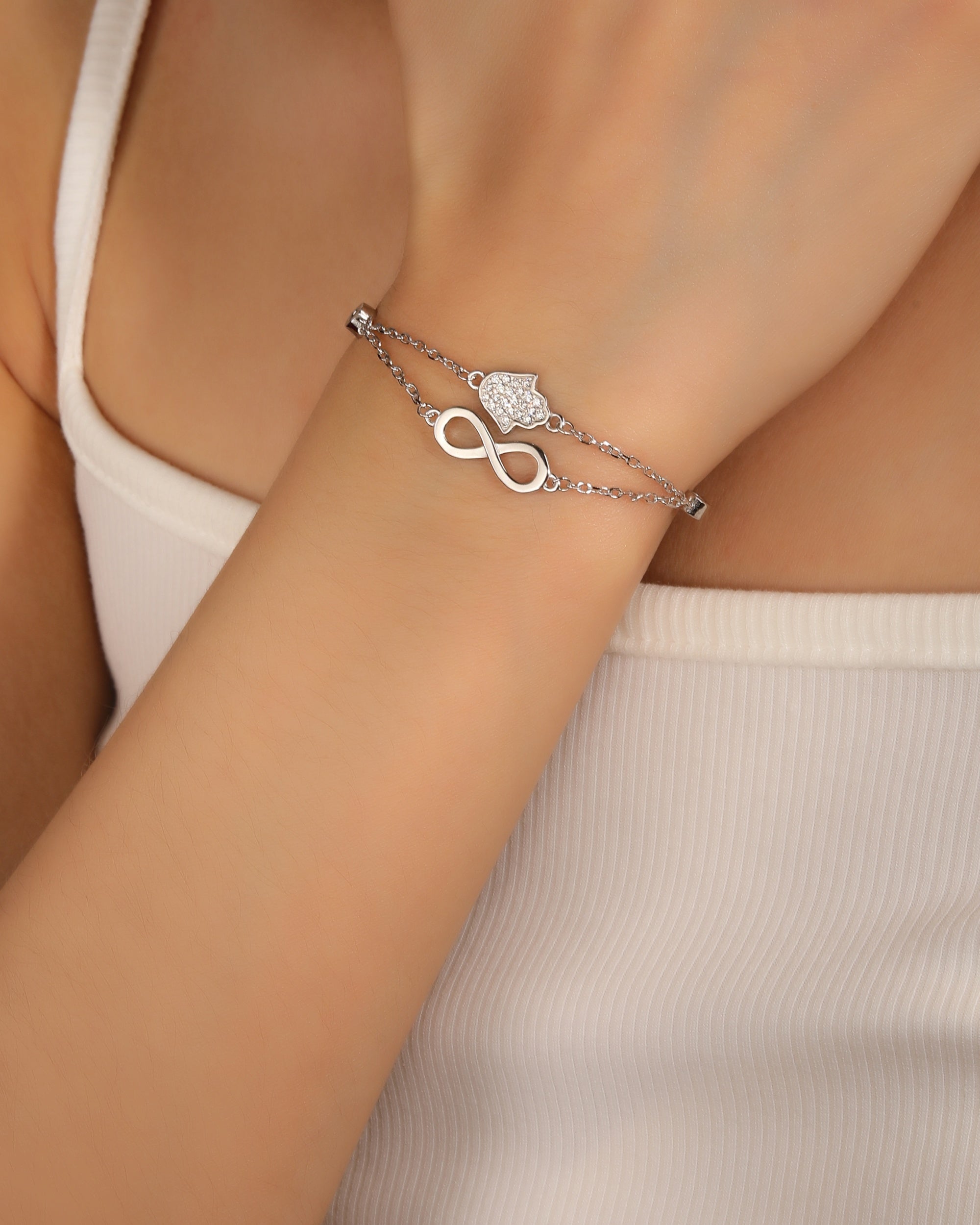 Pulsera doble de infinito con circonia blanca 17+3cm en rodizado