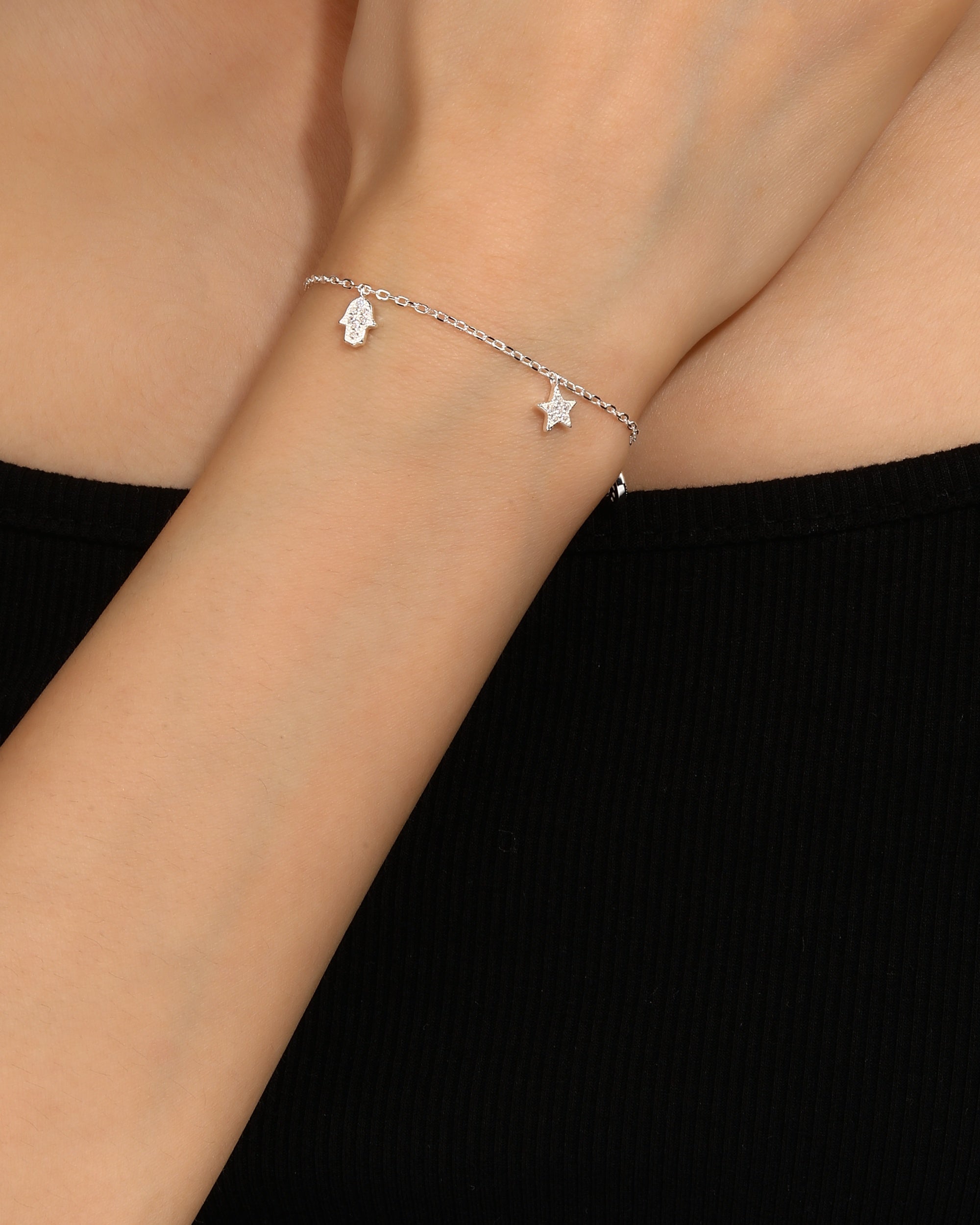 Pulsera de corazon estrella luna mariposa y mano de fatima 17+3cm en plateado