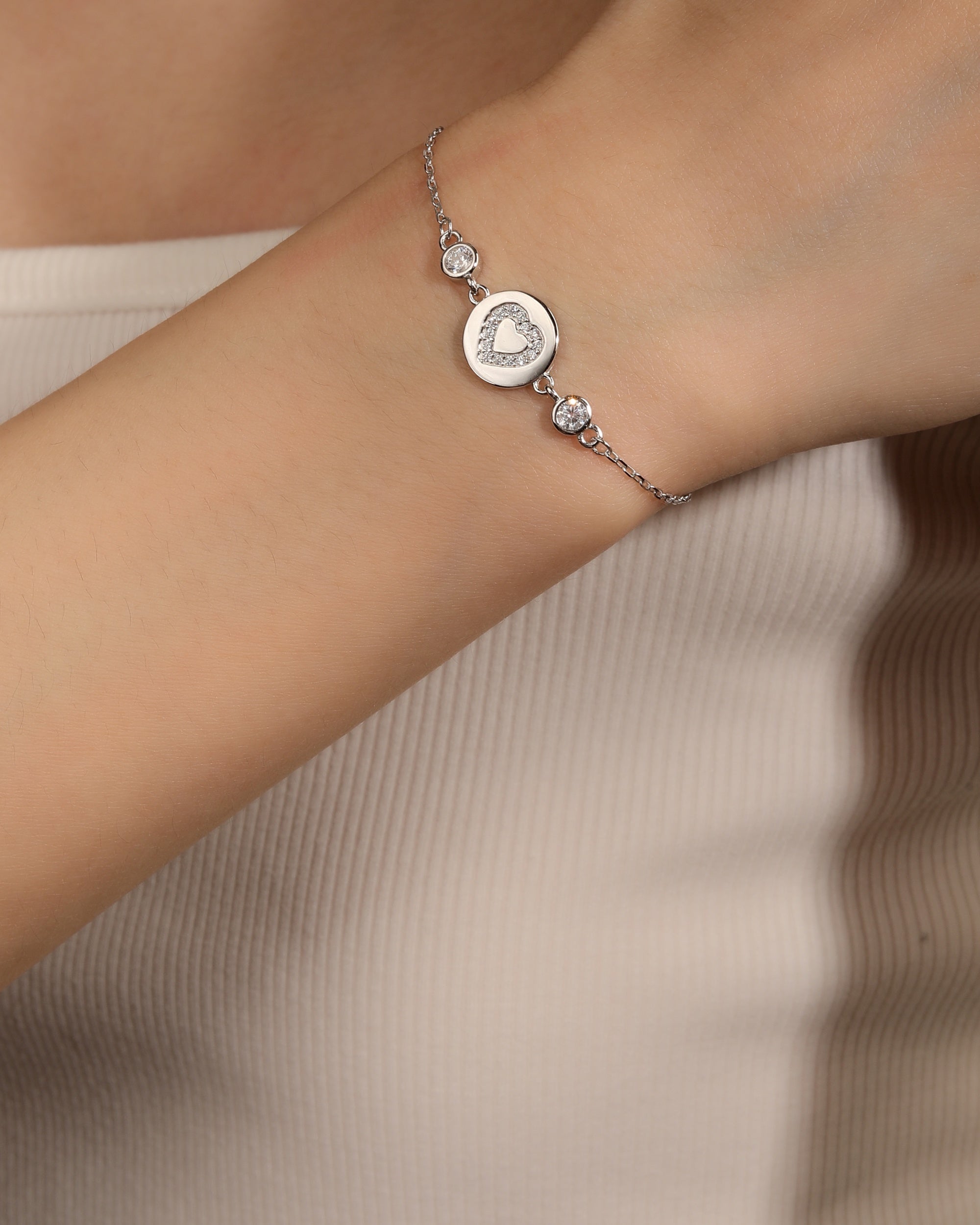 Pulsera sencilla de corazon con circonia blanca 17+3cm en rodizado