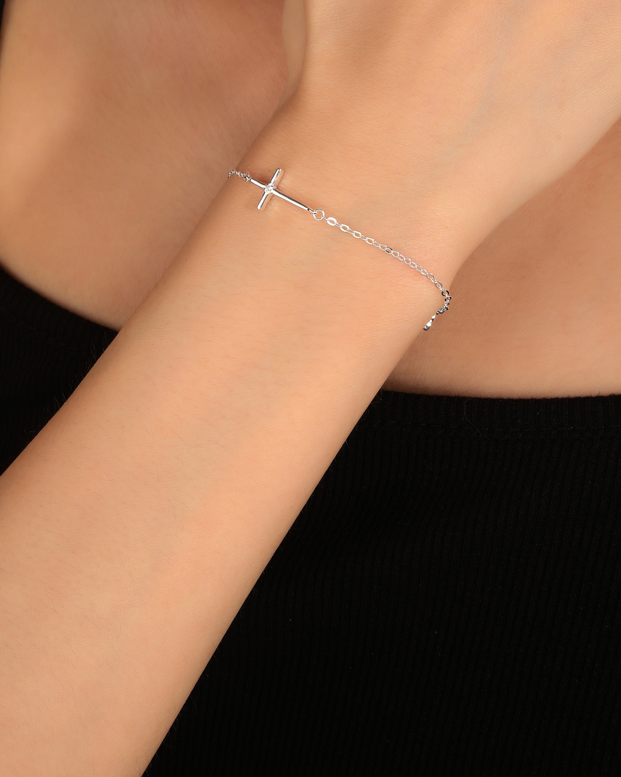 Pulsera sencilla de Cruces con circonia blanca 17+3cm en plateado