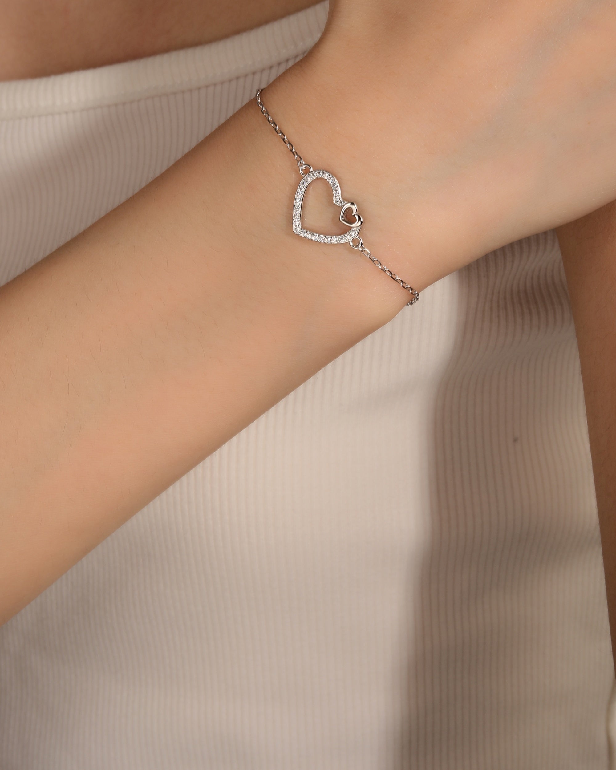Pulsera sencilla de corazon con circonia blanca 17+3cm en plateado
