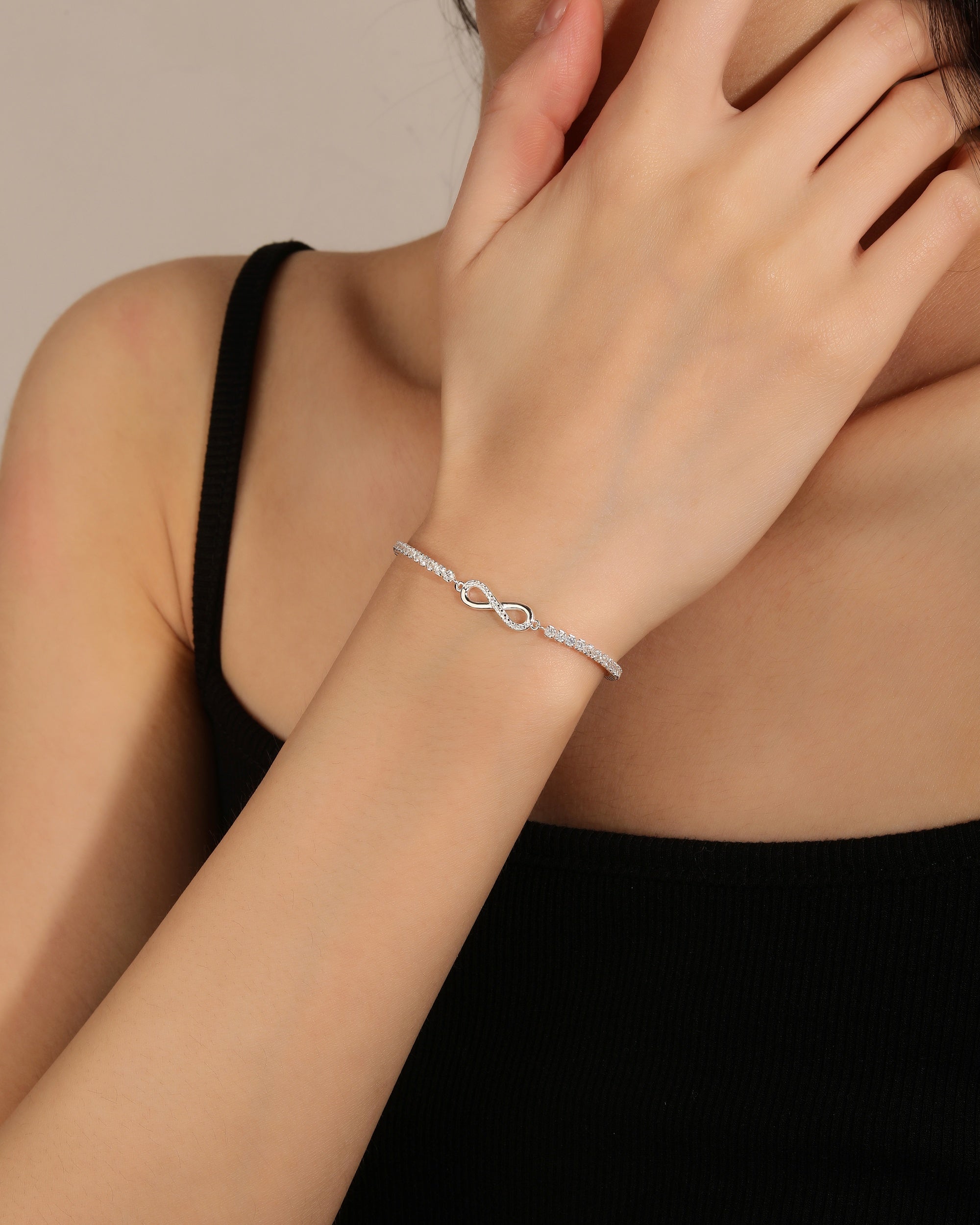 Pulsera tenis de infinito con circonia blanca de 17+3cm en plateado