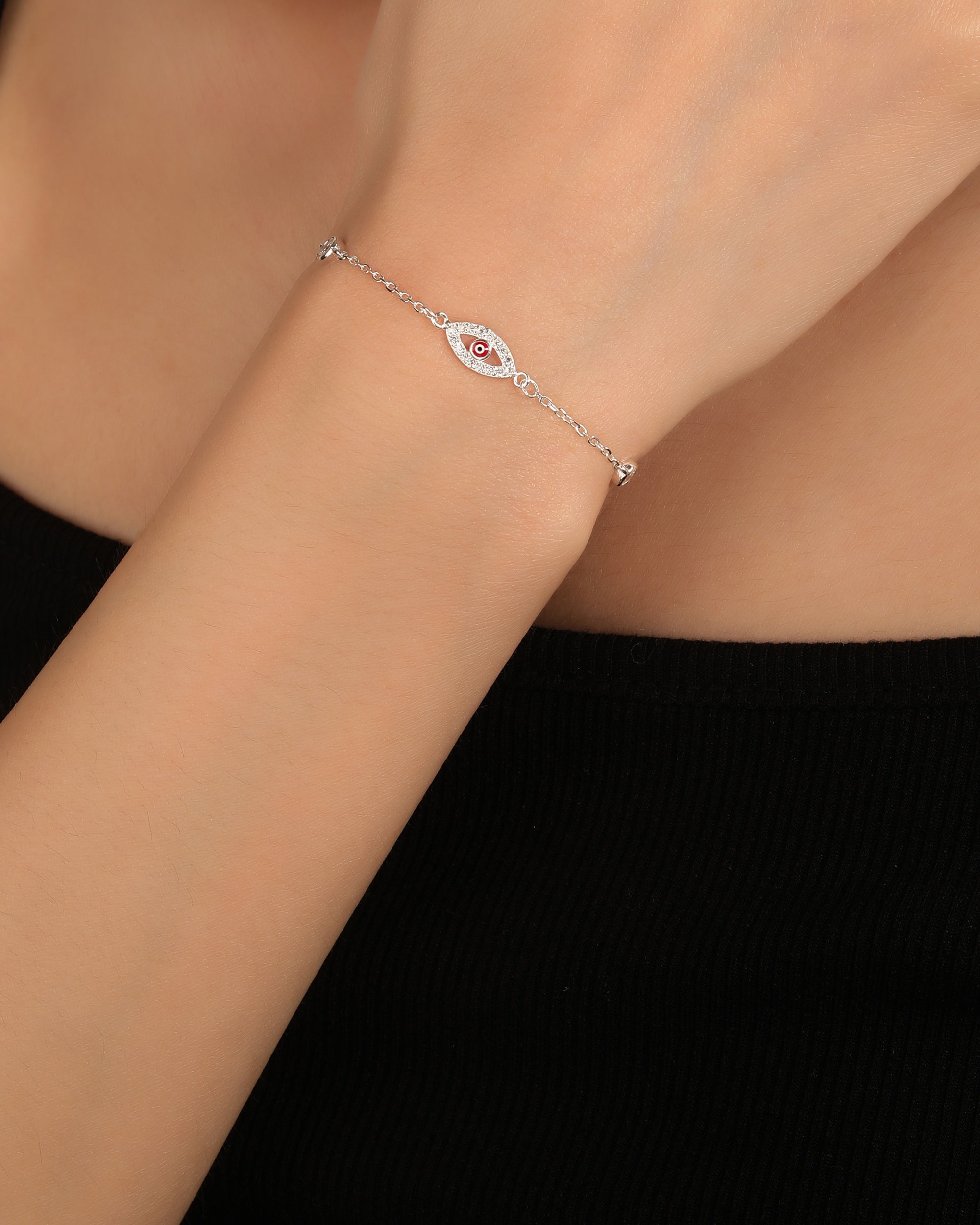 Pulsera con ojo de Dios de circonias con ojitos multicolor 17+3cm en plateado