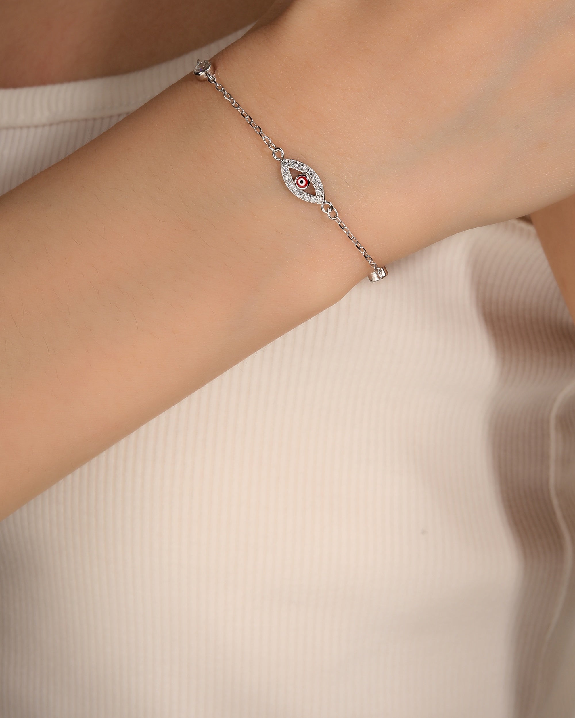 Pulsera con ojo de Dios de circonias con ojitos multicolor 17+3cm en rodizado