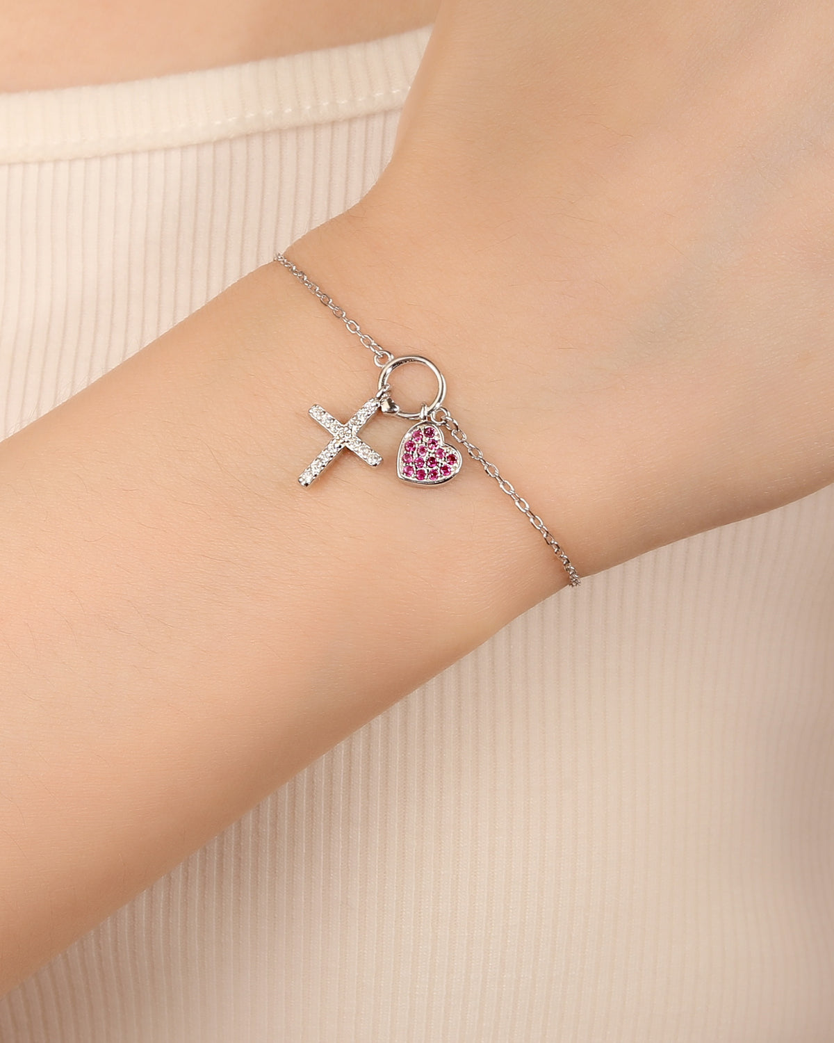 Pulsera de cruz y corazón con circonia 17+3cm en rodizado